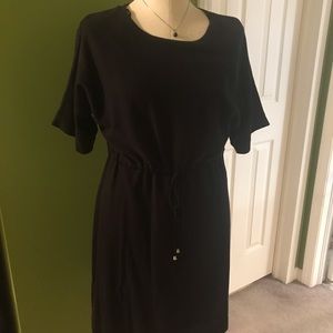 DENVER HAYES Black knit dress with self tie belt.